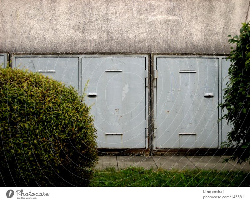 garbage compartments Bushes Trash Keg Wall (building) Trash container Rack Meadow Round Sharp-edged Door Gray Obscure Attic Sphere