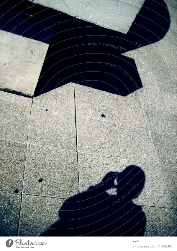 shadows of ourselves Independence Shadow Human being Man Concrete Structures and shapes Square Cubism Drinking Head Hand Shoulder Silhouette Looking Discover