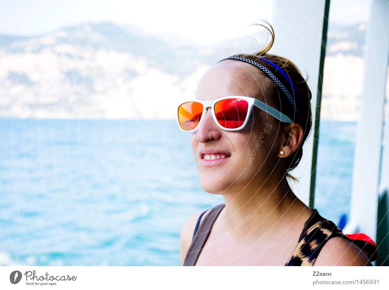 ahoy. Feminine 1 Human being 18 - 30 years Youth (Young adults) Adults Nature Wind Waves Coast Lakeside Lake Garda Earring Sunglasses Hairband Breathe To enjoy