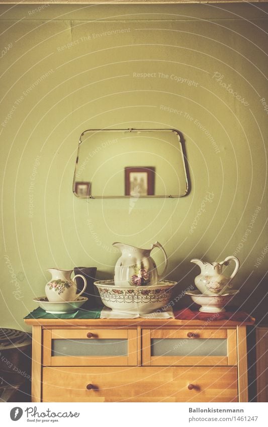 A fancy dresser from times gone by. stock photo sideboard Porcelain vintage Retro trash green Bedroom Historic Grandparents Mirror Jug Bowl washing bowl