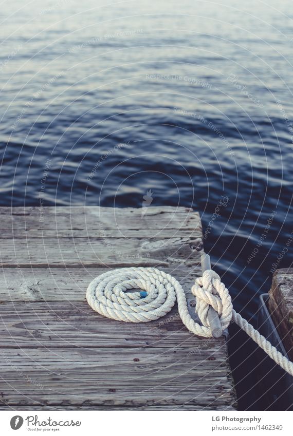 Dock - White Coiled Rope - a Royalty Free Stock Photo from Photocase
