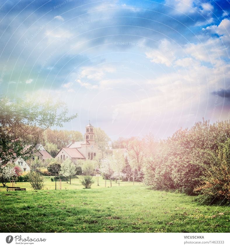 Rural village with blossoming trees and lawn in the park Lifestyle Vacation & Travel Summer Garden Nature Landscape Plant Sky Clouds Horizon Sunlight Spring