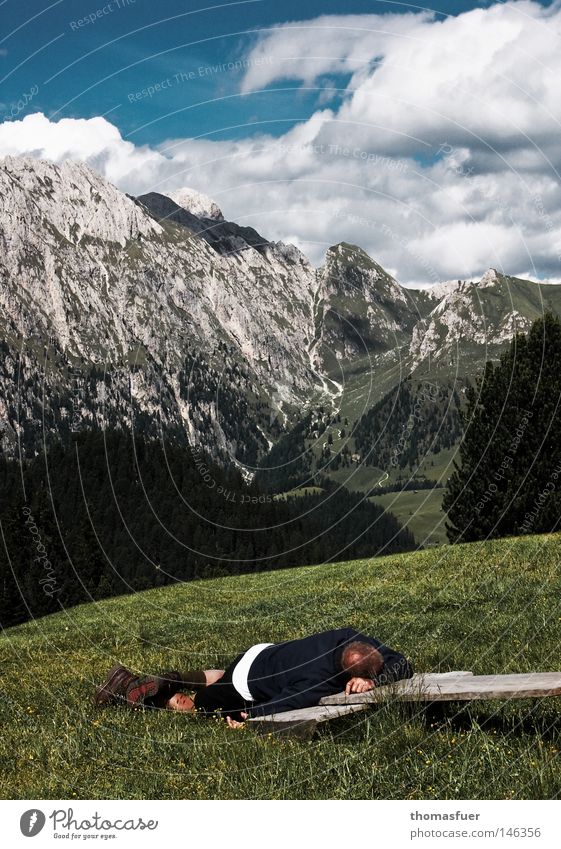 Wanderer's rest, weary wanderer in front of alpine peaks Mountain Hiking Sky Clouds Meadow Exhaustion Ambitious Alpine pasture Mountain meadow Fatigue