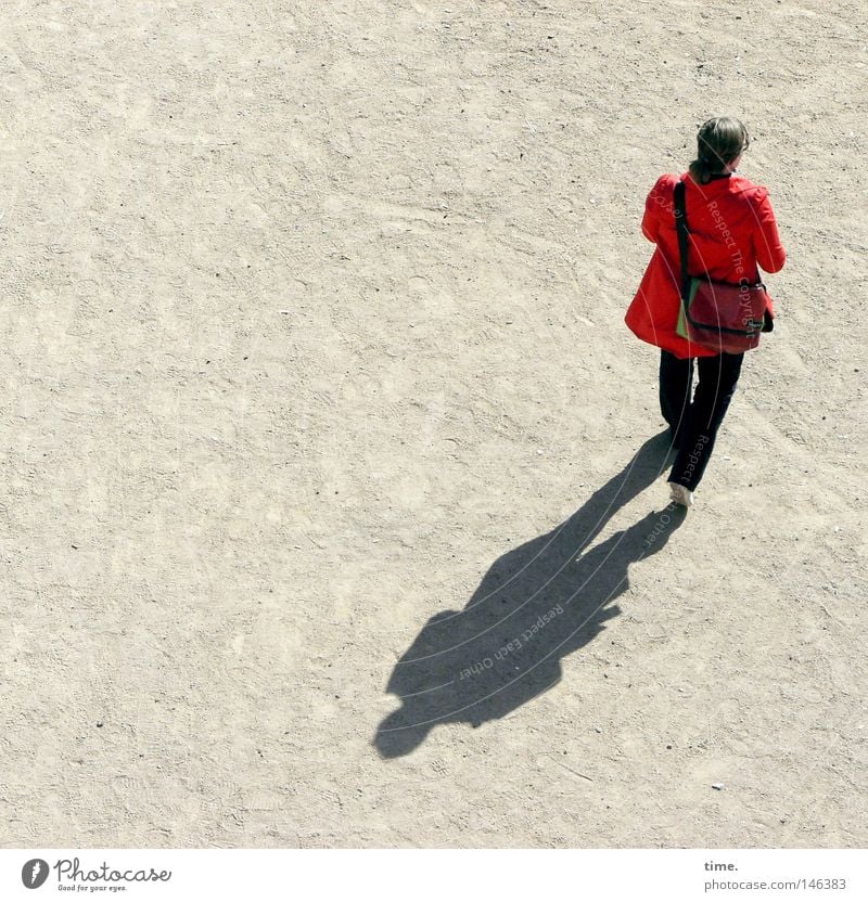 HH08.3 - Red jacket on a stalk Trip Feminine Woman Adults Back Places Traffic infrastructure Clothing Bag Going Sand place In transit Sunlight Individual