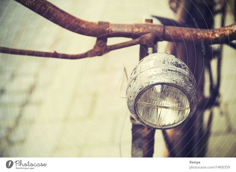 Retro bicycle lamp Bicycle Metal Rust Brown Nostalgia Bicycle handlebars Bicycle light Old Exterior shot Deserted Copy Space left Day Colour photo Detail