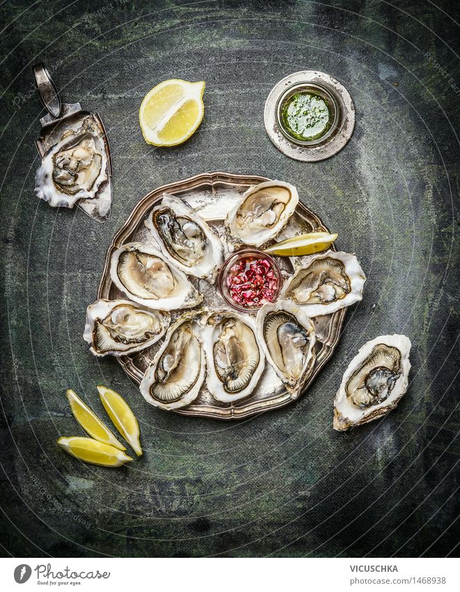 Oyster platter with lemon and various sauces Food Seafood Fruit Herbs and spices Cooking oil Nutrition Buffet Brunch Banquet Business lunch Vegetarian diet Diet