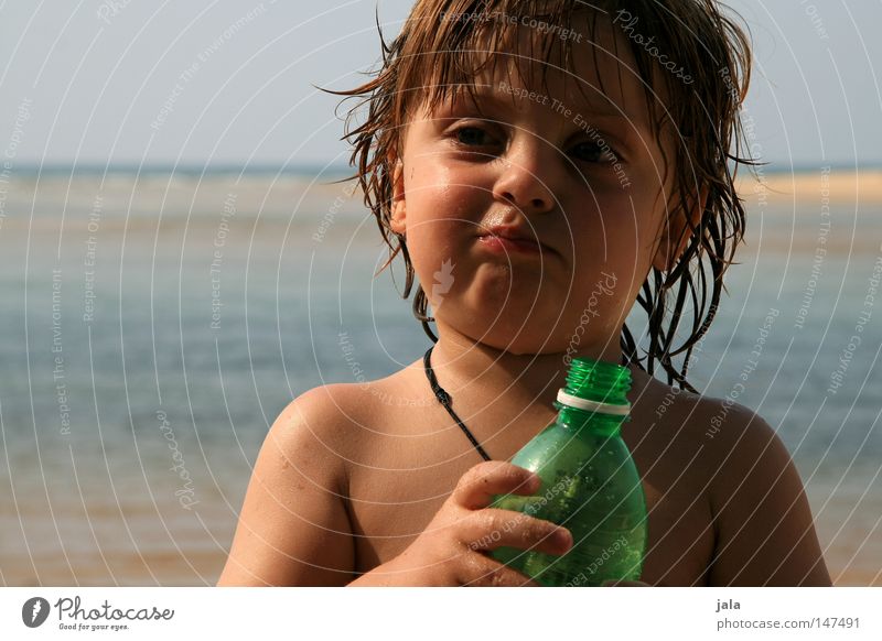 summer child Child Vacation & Travel Boy (child) Face Hand Water Ocean Beach Bottle Wet Facial expression Leather strip Shoulder Sand Sky Summer Skin