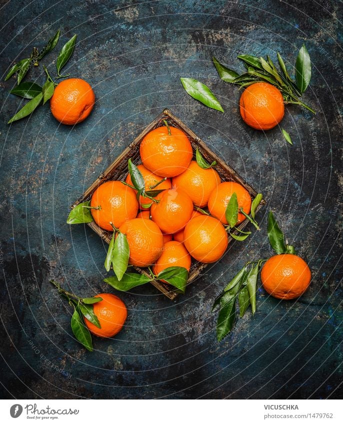 Fresh mandarins with leaves on dark background Food Fruit Orange Nutrition Style Design Healthy Healthy Eating Life Summer Winter Table Nature Yellow Vintage