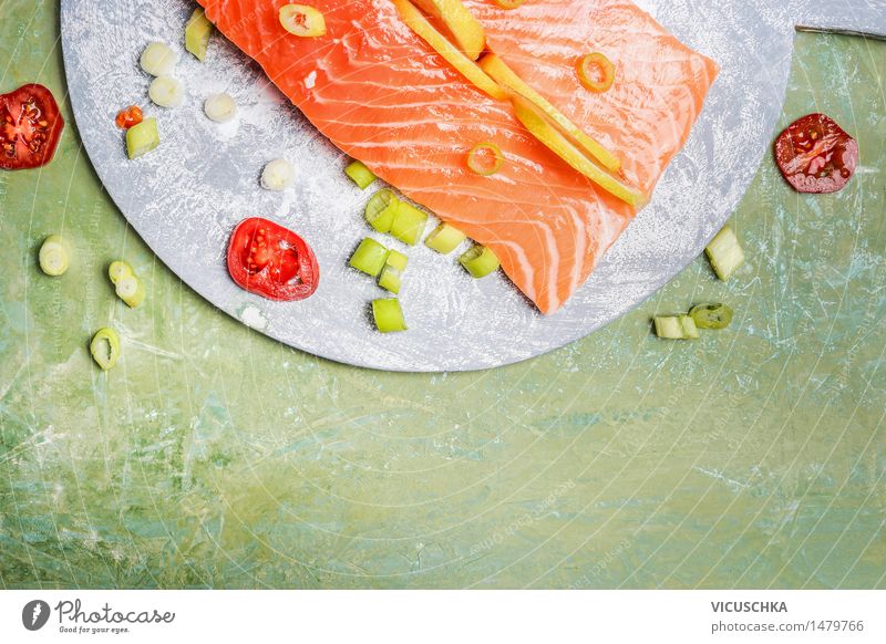 Salmon fillet with lemon and cooking ingredients Food Fish Herbs and spices Nutrition Lunch Dinner Buffet Brunch Banquet Organic produce Vegetarian diet Diet