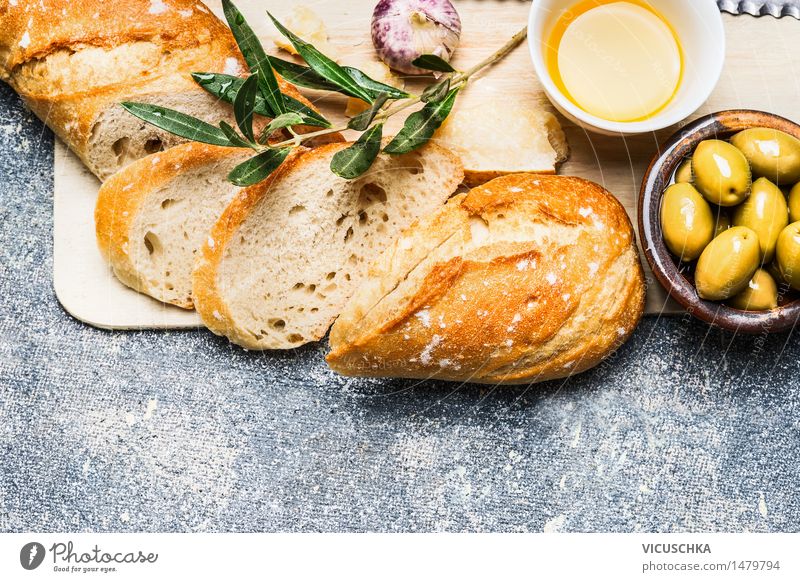 Baguette with olives, garlic and cheese Food Cheese Vegetable Herbs and spices Cooking oil Nutrition Lunch Dinner Organic produce Vegetarian diet Italian Food