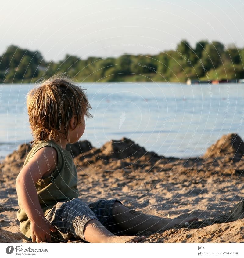 last day at the lake Looking Calm Lake Sand Boy (child) Water Sit Posture Weather Dream Longing Blonde Human being Vacation & Travel Leisure and hobbies Joy
