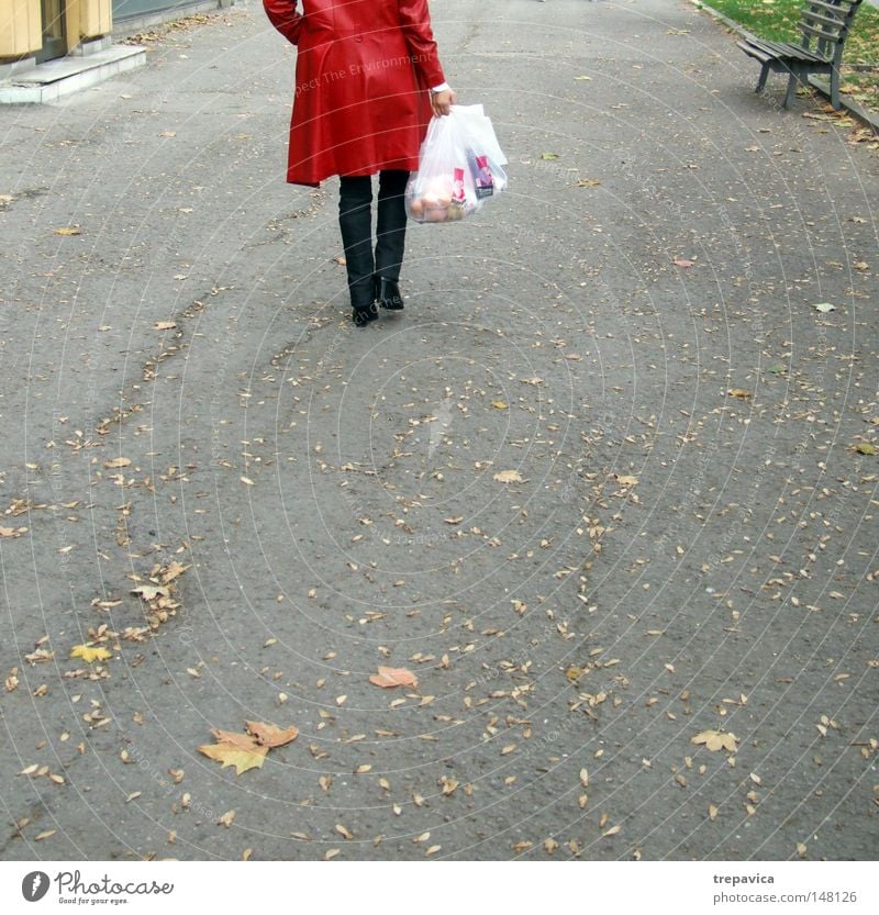 red Woman Leaf Shopping Bag Pouch Coat Asphalt Human being Plastic bag Sack Autumn Street Loneliness Legs Walking