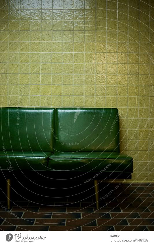 green squares - seats, tiles, floor Furniture Bathroom Wall (barrier) Wall (building) Plastic Sit Wait Creepy Cold Yellow Green Loneliness Colour Boredom Couch