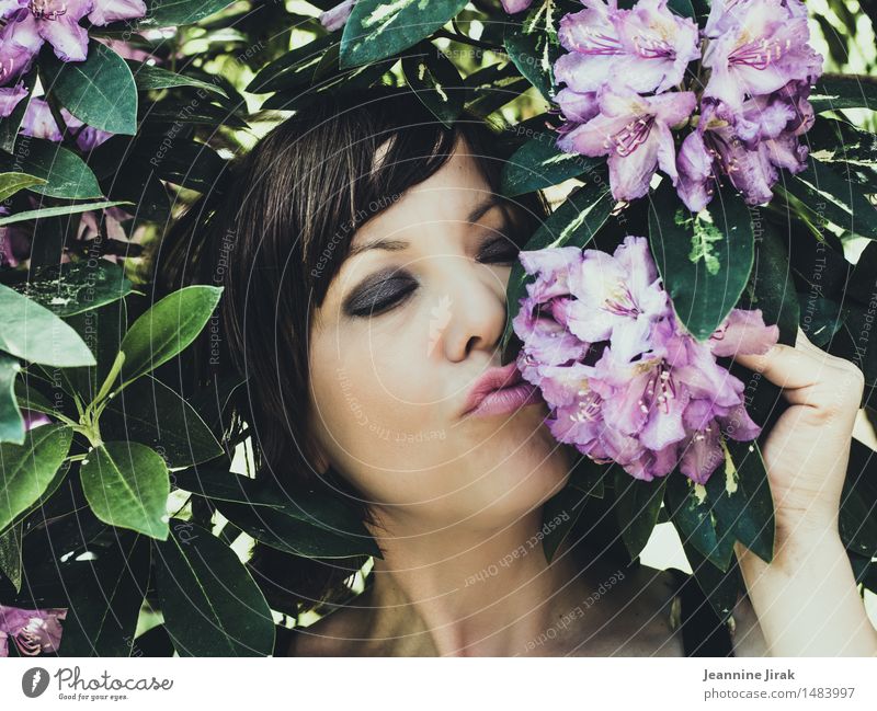 Woman with flowers Mother's Day Spring celebration Feminine Head Face 1 Human being Summer Bushes Fragrance To enjoy Kissing Esthetic Happy Violet Joy