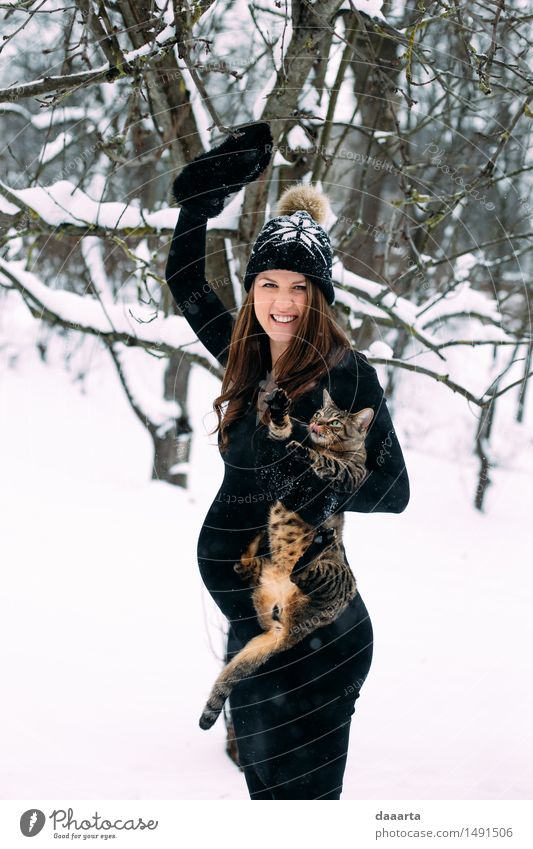 mom with a cat Lifestyle Elegant Style Joy Harmonious Leisure and hobbies Playing Trip Adventure Freedom Winter Snow Winter vacation Feminine Young woman
