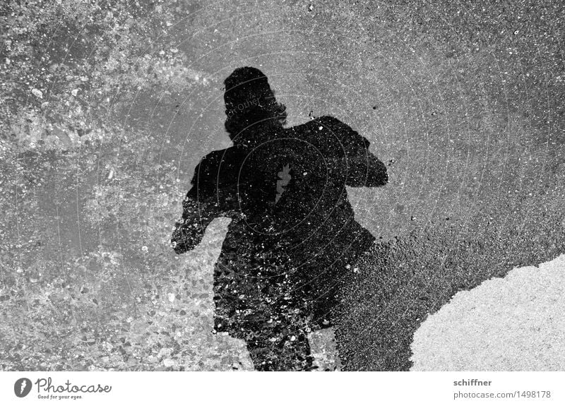 Who's afraid of the black man? Human being Masculine Young man Youth (Young adults) 1 Gray Black White Puddle Reflection Mirror image Dark Fear Harrowing Cruel