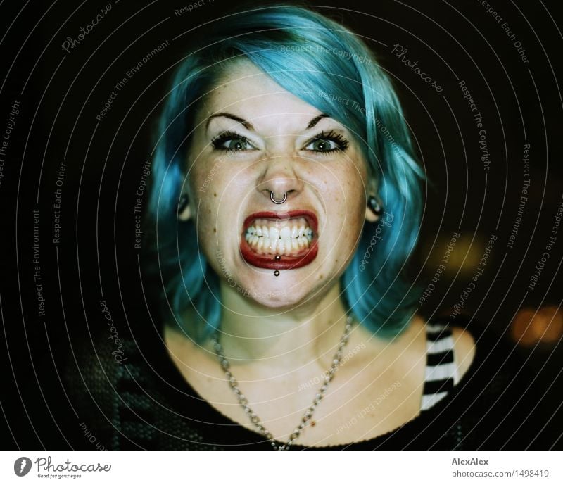 young woman with turquoise hair and freckles shows teeth and makes wild aggressive face Joy Young woman Youth (Young adults) Hair and hairstyles Face Teeth
