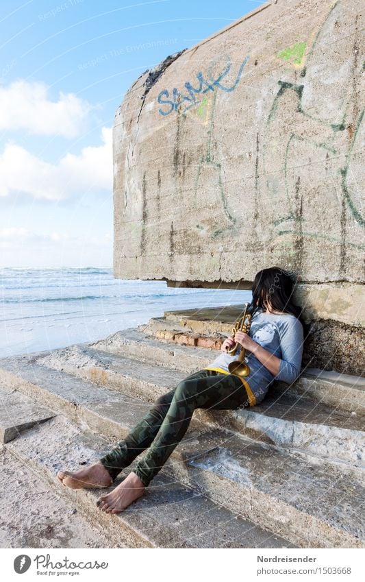 In thought... Relaxation Vacation & Travel Ocean Human being Feminine Woman Adults Beautiful weather North Sea Ruin Manmade structures Architecture Fashion