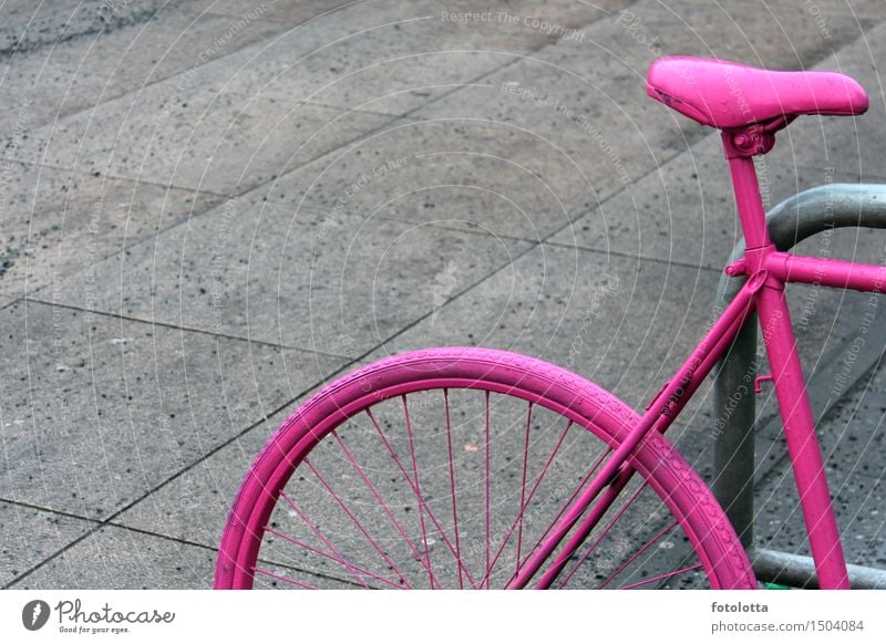 bicycle Bicycle Cycling tour Bicycle saddle Bicycle frame Bicycle rack Trip Sidewalk Paving tiles Stone Metal Driving Gray Pink Parking Associated Car-free