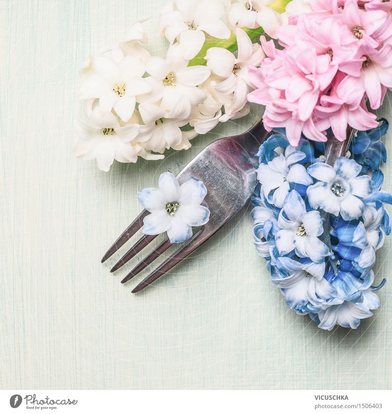Fork with hyacinth flowers on light green background Lunch Banquet Style Design Decoration Table Restaurant Feasts & Celebrations Valentine's Day Mother's Day