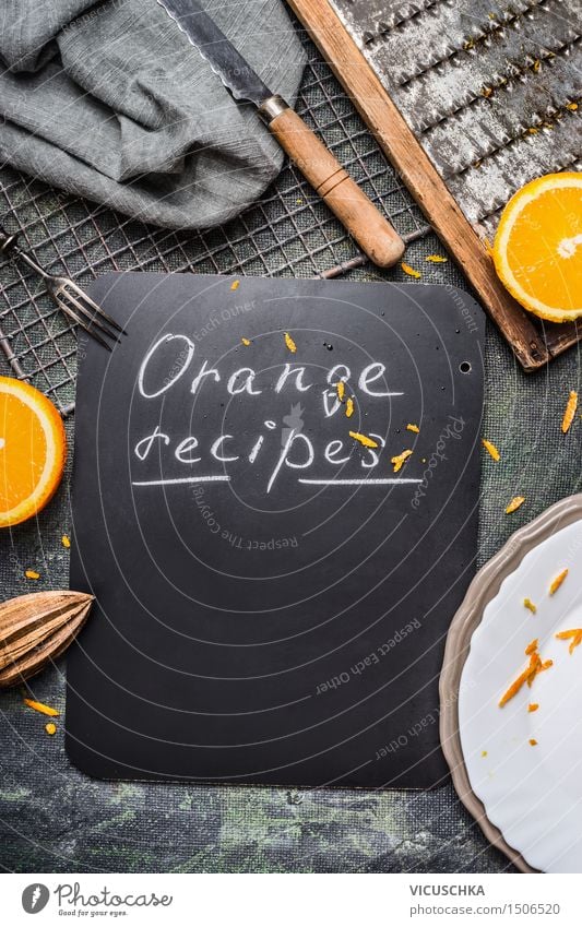 Orange recipes background with kitchen utensils Food Nutrition Breakfast Organic produce Juice Crockery Plate Bowl Cutlery Knives Fork Healthy Eating Life Table