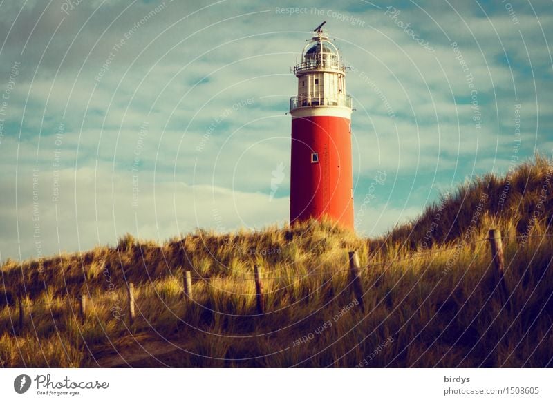 Lighthouse on Texel Vacation & Travel Sky Clouds Coast North Sea Island Beach dune Marram grass Tower Tourist Attraction Landmark Esthetic Historic Tall