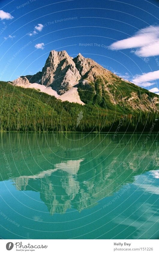 (water) mountain Colour photo Multicoloured Exterior shot Deserted Copy Space bottom Day Reflection Long shot Mountain Water Clouds Coast Lake Blue Green Canada