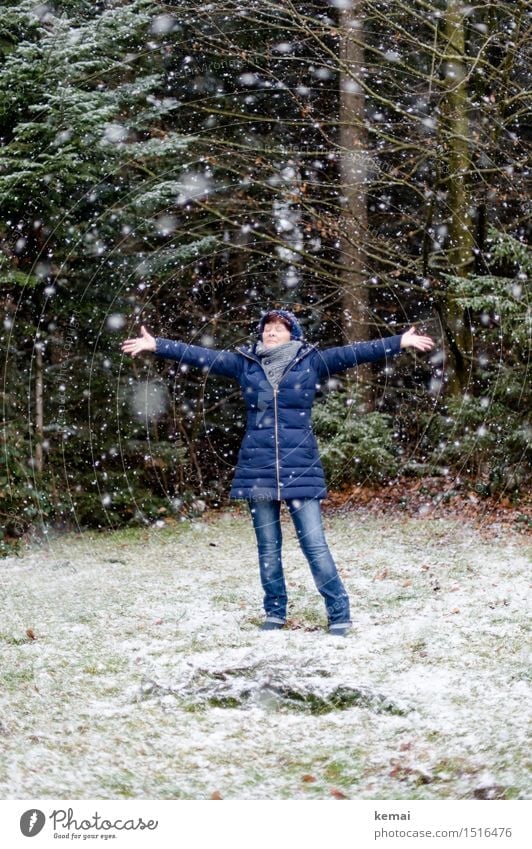 Woman with blue jacket at the edge of forest during snowfall Lifestyle Style Playing Trip Freedom Winter Human being Feminine Adults Female senior 1