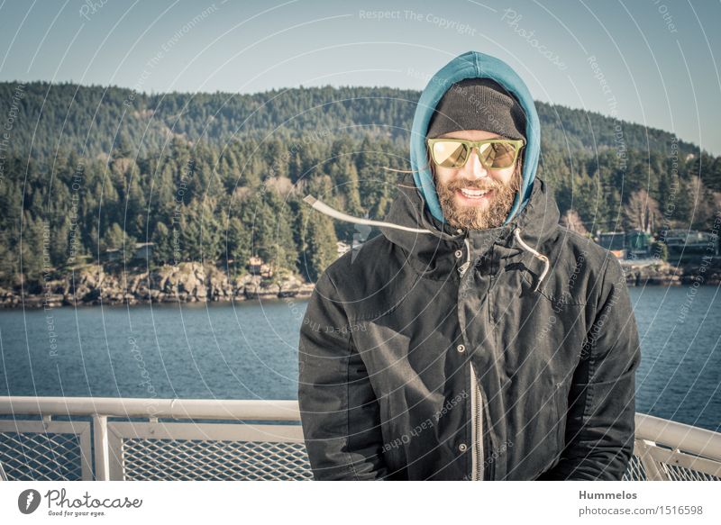 Portrait in the wind Human being Adults 1 30 - 45 years Esthetic Cool (slang) Americas road trip Portrait photograph Man Facial hair Ferry sunglasses Winter