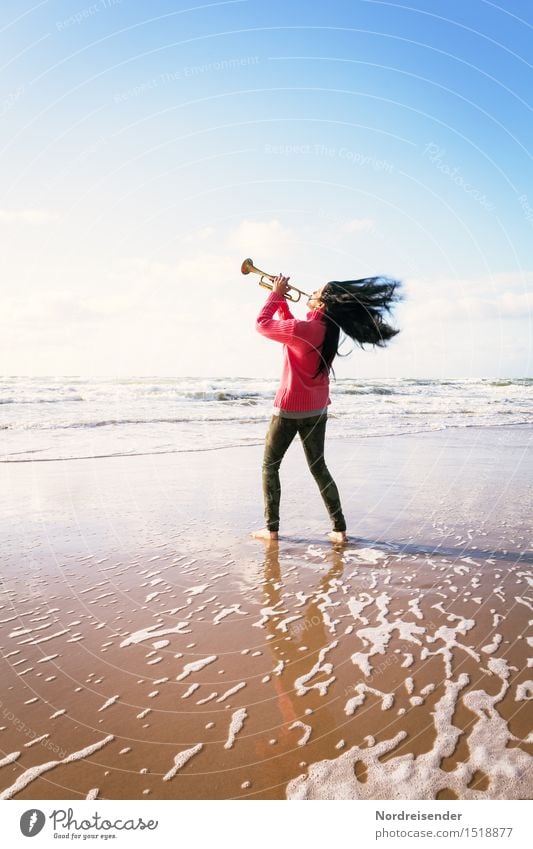 Young woman with a trumpet on the beach Lifestyle Style Joy Human being Feminine Woman Adults Music Musician Beautiful weather Wind Gale Beach North Sea Ocean