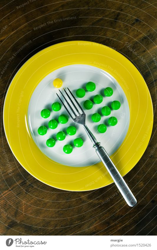 Impaled! A plate with a yellow rim and green peas well arranged, a fork and a yellow pill Food Dessert Nutrition Breakfast Lunch Organic produce Vegetarian diet