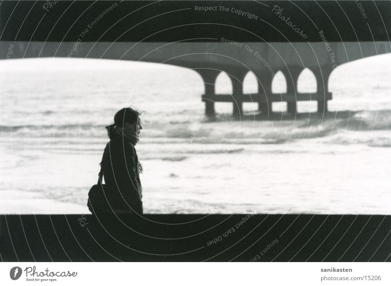 strand-annett England Beach Ocean Jetty Woman Black & white photo