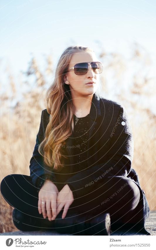 Getting the sun again Lifestyle Elegant Style Young woman Youth (Young adults) Nature Landscape Autumn Beautiful weather Common Reed Fashion Coat Sunglasses