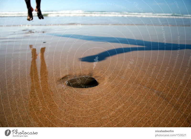 Take off in the New Year Beach Ocean Sand Stone Waves Portugal Wet Shadow Happiness Summer 2009 Joy Transience Feet