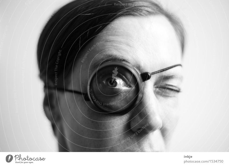 target cap Lifestyle Leisure and hobbies Detective Adults Face Eyes 1 Human being 30 - 45 years Magnifying glass monocle Glass Observe Discover Looking Nerdy