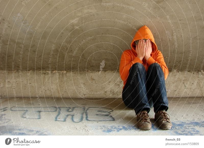"The" hooded man cries Hooded (clothing) Human being Orange Concrete Bridge Sit Interlock Cry Grief Distress Loneliness Emit Tramp Cheap Tears Poverty