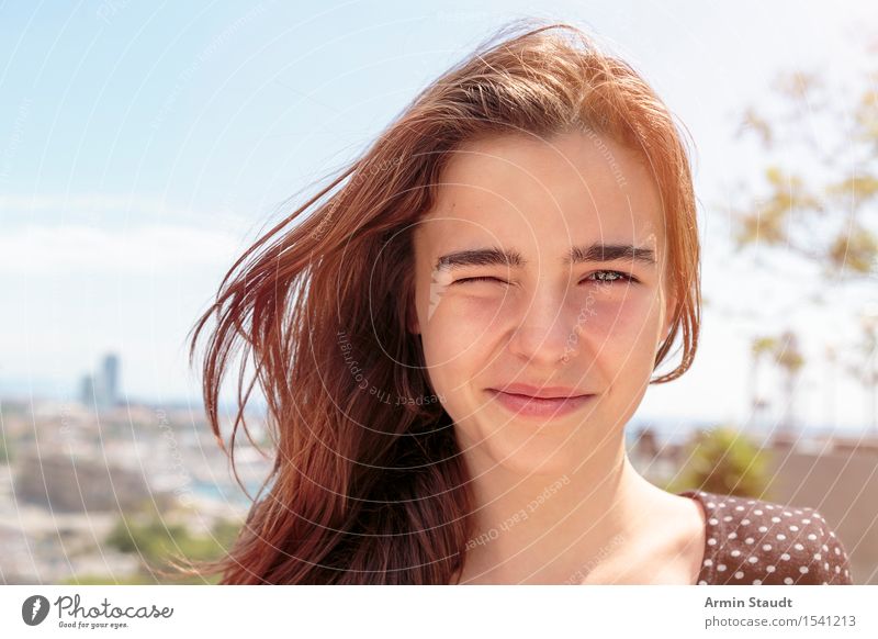 smiling young woman blinded by the sun or winking Lifestyle Style pretty Well-being Vacation & Travel Tourism City trip Summer vacation Human being Feminine