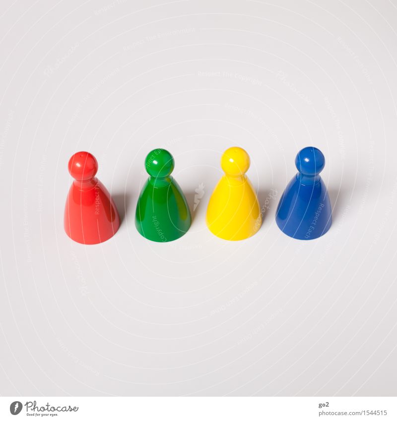 Colourful cones Leisure and hobbies Playing Board game Children's game Meeting To talk Team Skittle Conical Communicate Uniqueness Blue Multicoloured Yellow