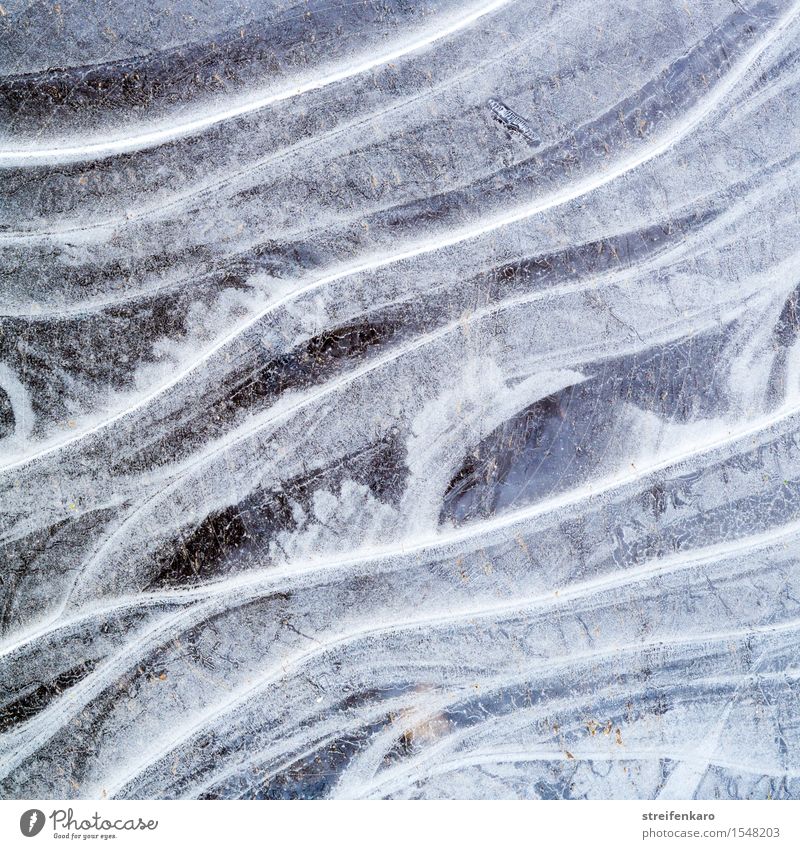 Ice structures in frozen water Environment Nature Elements Water Winter Frost Snow Waves Pond Lake Puddle Frozen surface Line Freeze Esthetic Firm Cold Bizarre
