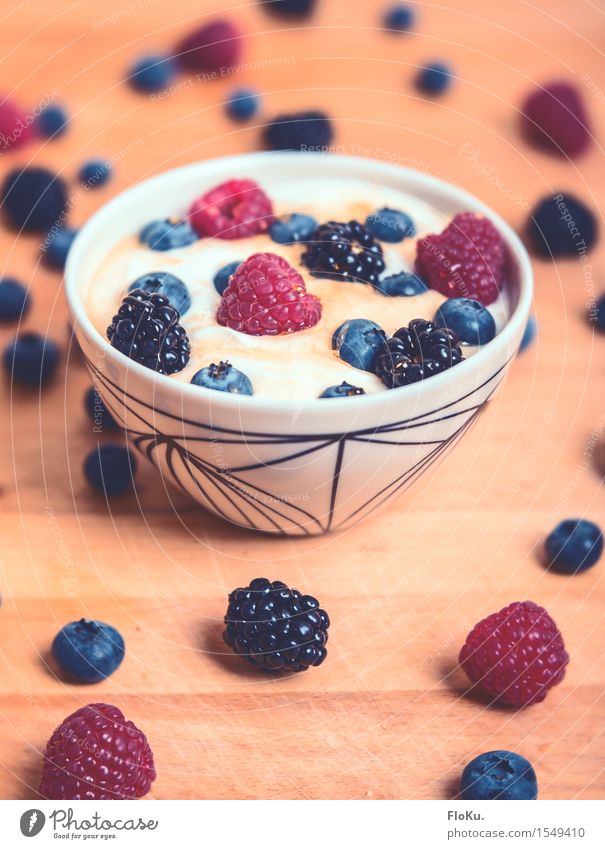 Who throws the berries into his bowl like that? Food Yoghurt Dairy Products Fruit Dessert Nutrition Breakfast Organic produce Vegetarian diet Diet Bowl Fresh