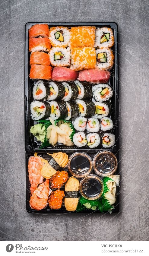 Sushi Menu in black packing box Food Nutrition Buffet Brunch Asian Food Style Design Healthy Eating Restaurant various japanese Dish Japan Food photograph Fish