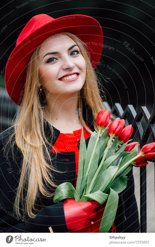 Woman standing on the park background with flowers Elegant Style Beautiful Garden Human being Girl Adults Nature Weather Flower Tulip Park Fashion Clothing