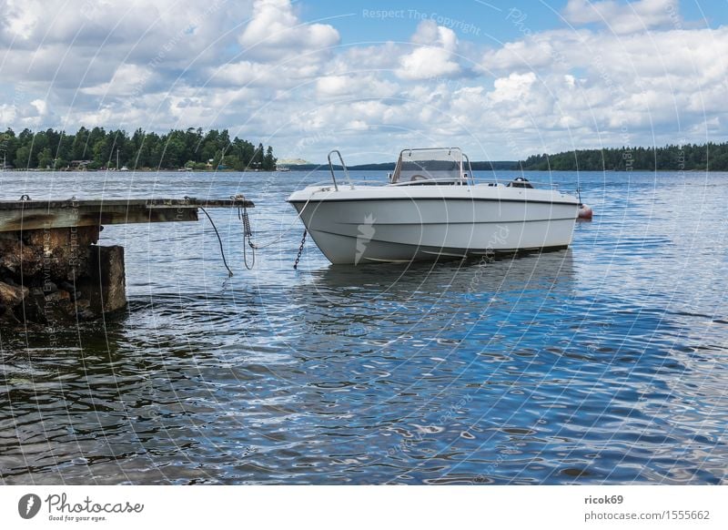 Boat on the Swedish coast Relaxation Vacation & Travel Tourism Island Nature Landscape Clouds Tree Coast Baltic Sea Watercraft Blue Green Skerry Swede Lidingö