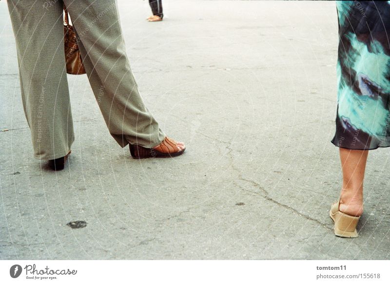 three legs Footwear Bag Human being Street Dress Wait Concrete Gray Group Legs Date Aspahlt