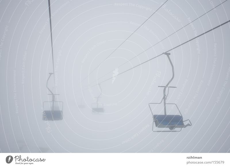 Chair lift to nowhere Alps Swiss Alps Fog Snow Infinity Winter sports Transience Riederalp hollow cold cold cold