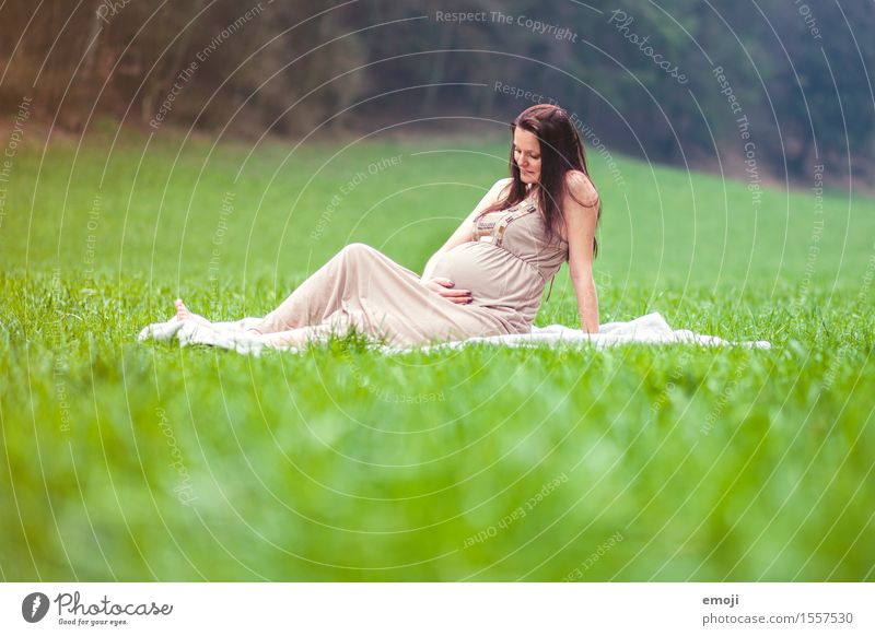 in expectation Feminine Young woman Youth (Young adults) Adults 1 Human being 18 - 30 years Meadow Natural Green Pregnant Colour photo Exterior shot Day