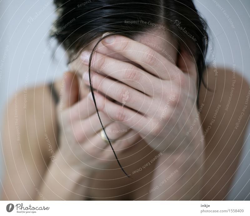 Sad woman hides face with her hands Lifestyle Style pretty Woman Adults Hair and hairstyles Hand Strand of hair 1 Human being 30 - 45 years Sadness Cry Near