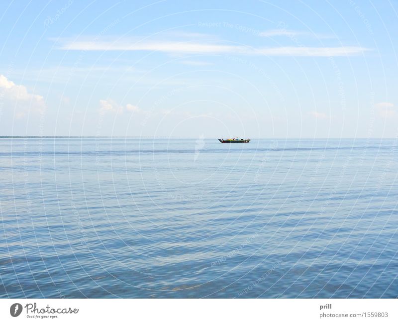 lonely boat in Cambodia Ocean Culture Water Horizon Rowboat Watercraft Small Loneliness Dangerous Tradition Survive Surface Asia forsake sb./sth. peril Barque