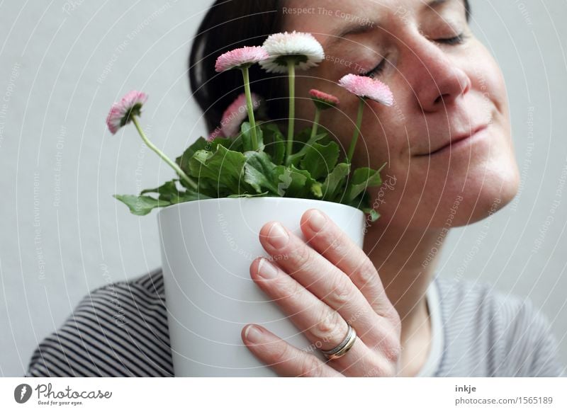 Flowers are okay. Lifestyle Leisure and hobbies Woman Adults Face Hand 1 Human being Spring Pot plant Bouquet Flowerpot Smiling Love Embrace Emotions Moody