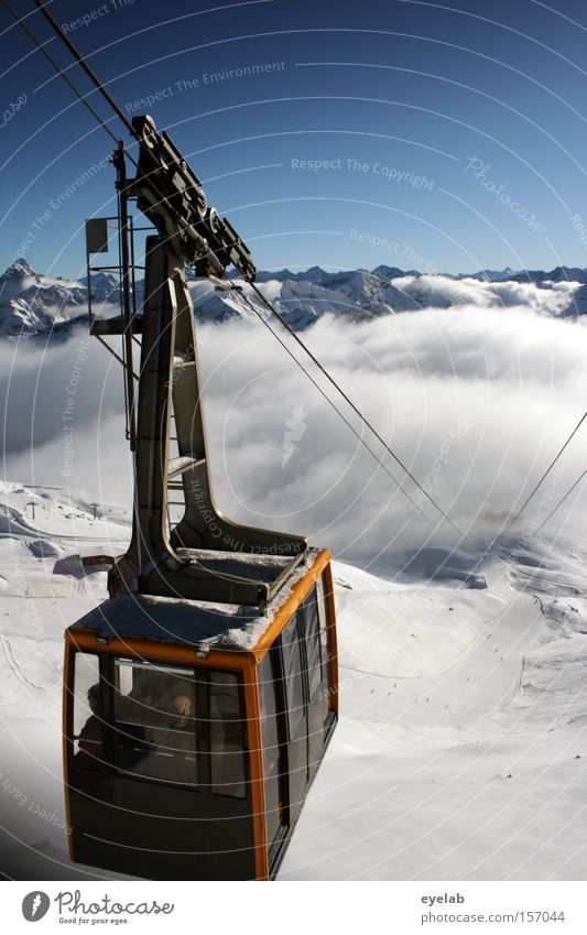 Gemma nauf...gemma widda nunder Cable car Mountain Winter Clouds Sky Peak Wire cable Rope Far-off places Vantage point Snow summit railway Winter vacation